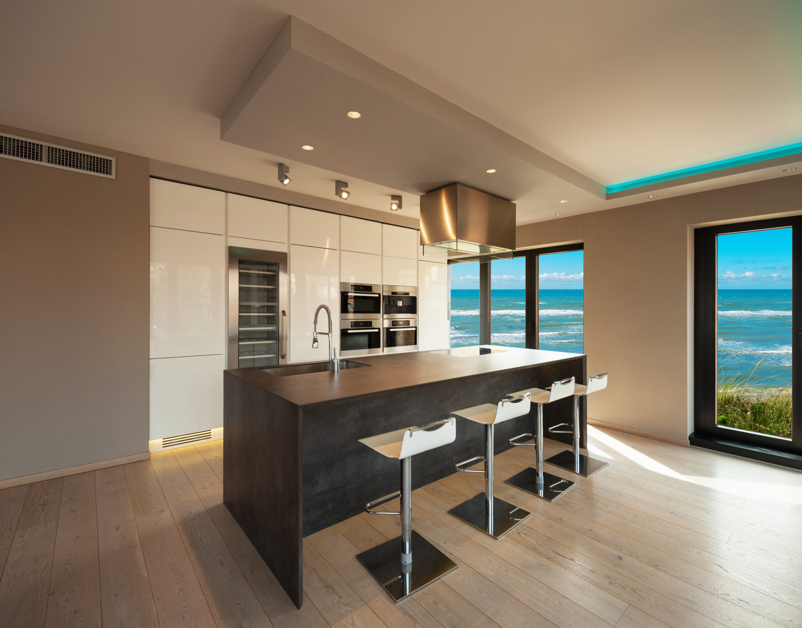 Interiors of a modern apartment, without furniture, sea view
